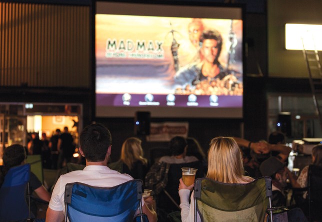 A September screening of "Mad Max" in Burnside Brewing’s parking lot was the last event of the Brew Masterpiece series season. | Photo by Anna Campbell